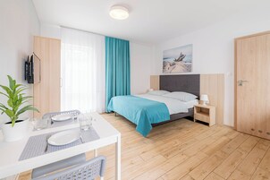 Double Room, Kitchenette | Laptop workspace, blackout drapes, iron/ironing board, free WiFi