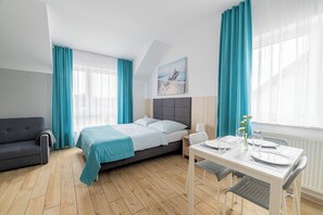 Studio Suite, Kitchenette | Laptop workspace, blackout drapes, iron/ironing board, free WiFi - Villa Blanca (Kolobrzeg)
