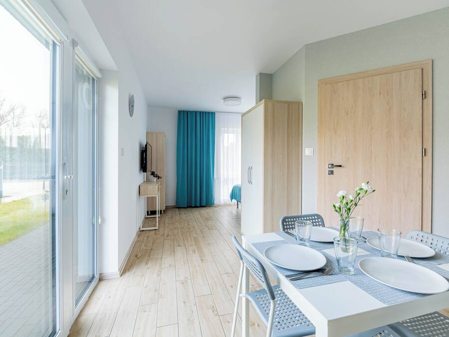 Quadruple Room, Kitchenette | Laptop workspace, blackout drapes, iron/ironing board, free WiFi