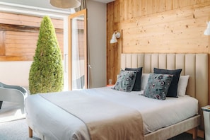 Family Room | 2 bedrooms, premium bedding, in-room safe, blackout drapes
