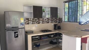 Fridge, stovetop, cookware/dishes/utensils