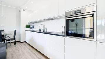 Apartament (36) | Cozinha privada | Geladeira, cooktop, chaleira elétrica