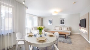 Apartment (102) | Living area | Flat-screen TV - Apartamenty Sun & Snow Olymp (Kolobrzeg)