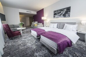 Deluxe Double Room | Minibar, in-room safe, desk, blackout drapes