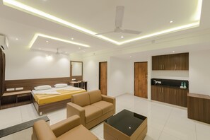 Luxury Suite | Desk, rollaway beds, bed sheets - Hotel Karuna Residency (Mangaluru)