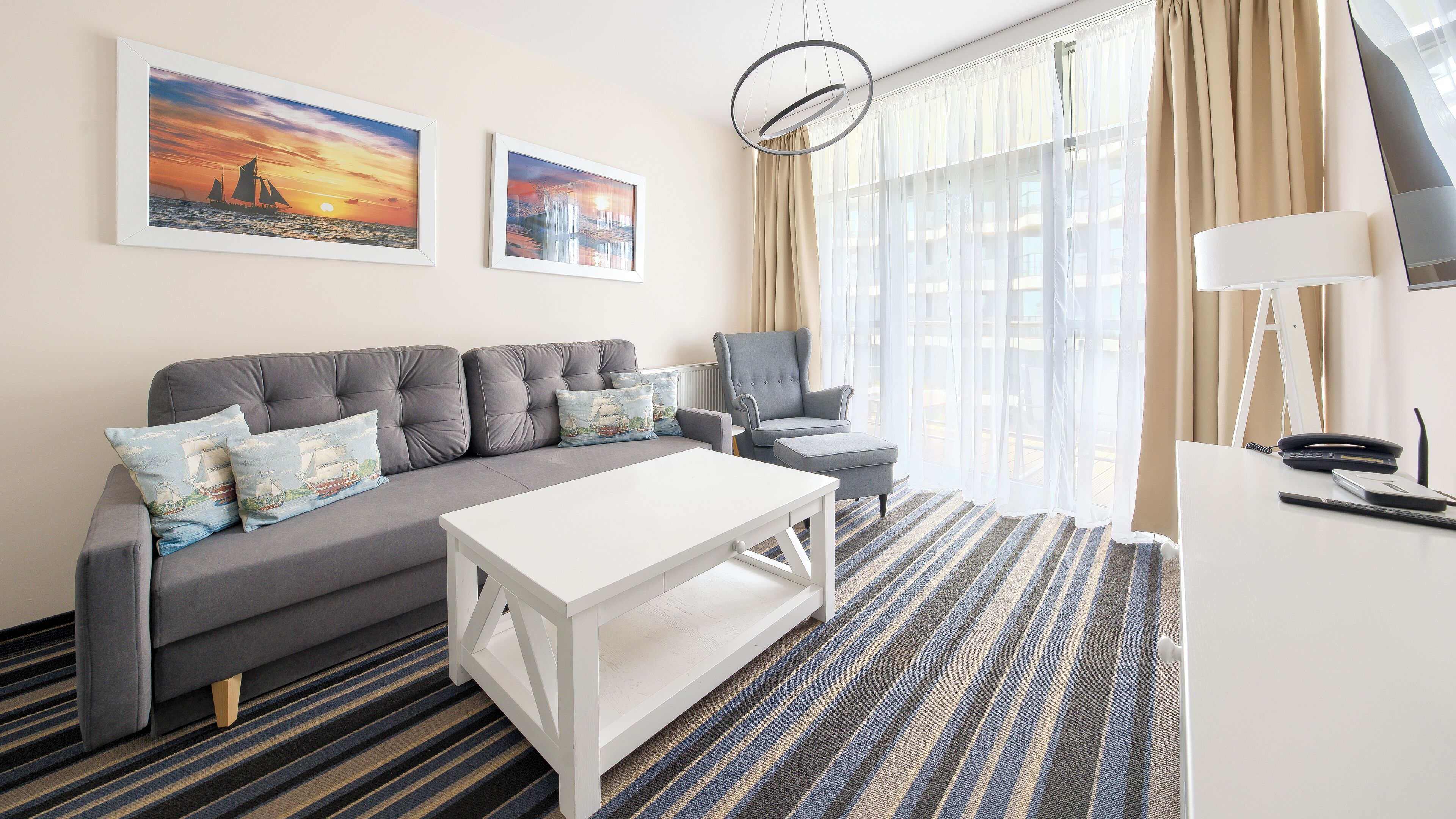 Deluxe Apartment, Sea View (423) | Living area | Flat-screen TV