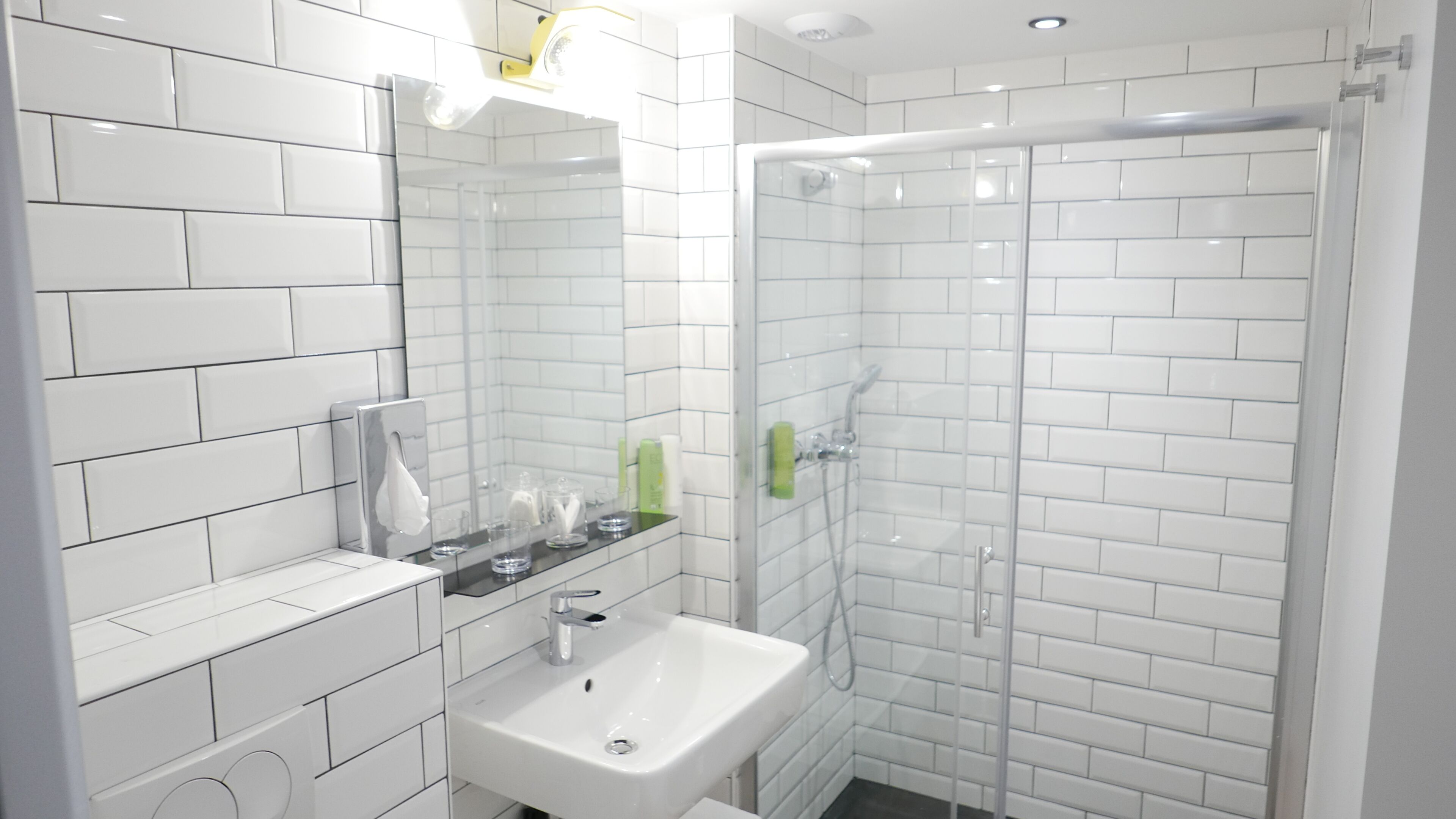 shower, rainfall showerhead, hair dryer, towels