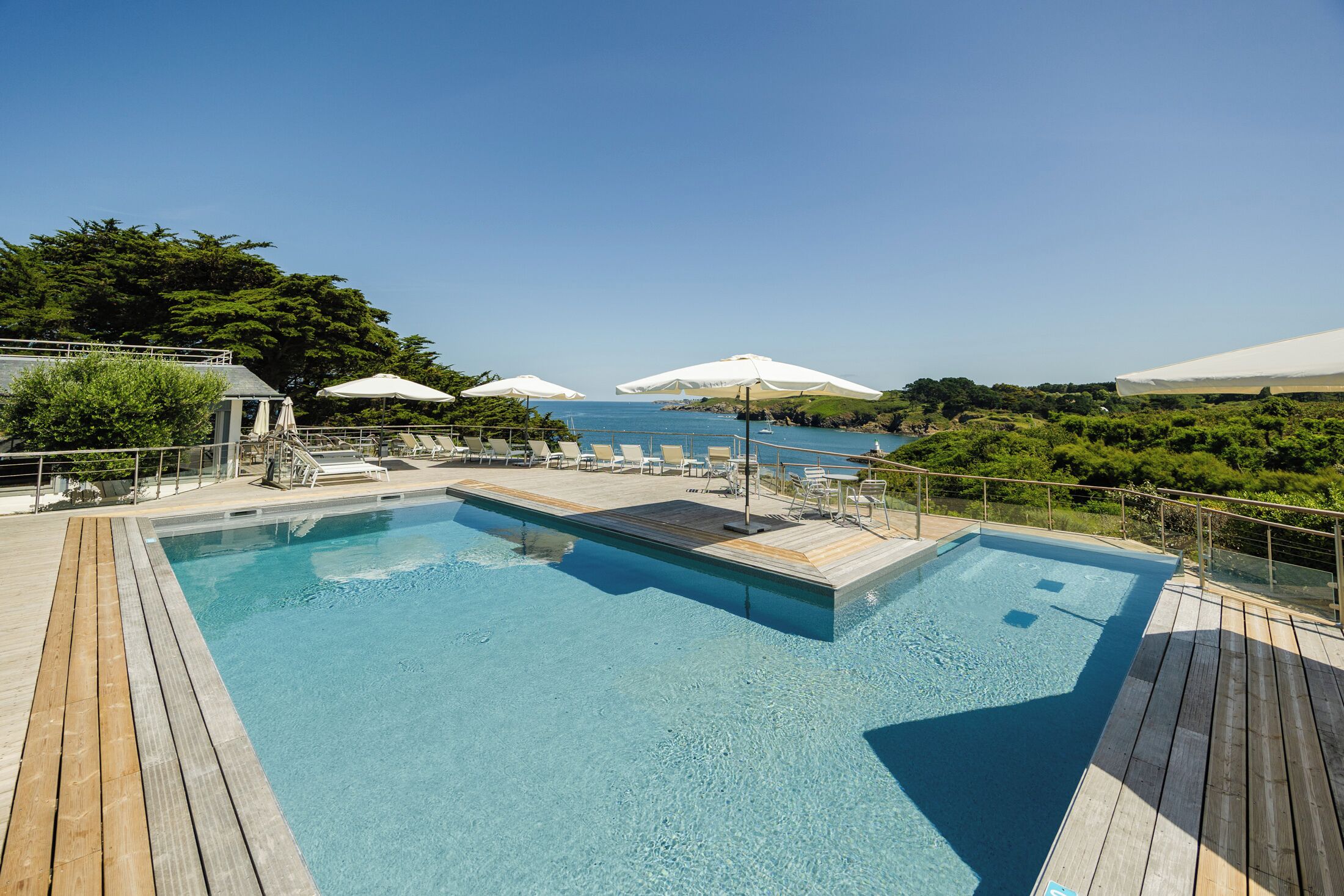 Outdoor pool, open 9:00 AM to 8:00 PM, pool umbrellas, sun loungers