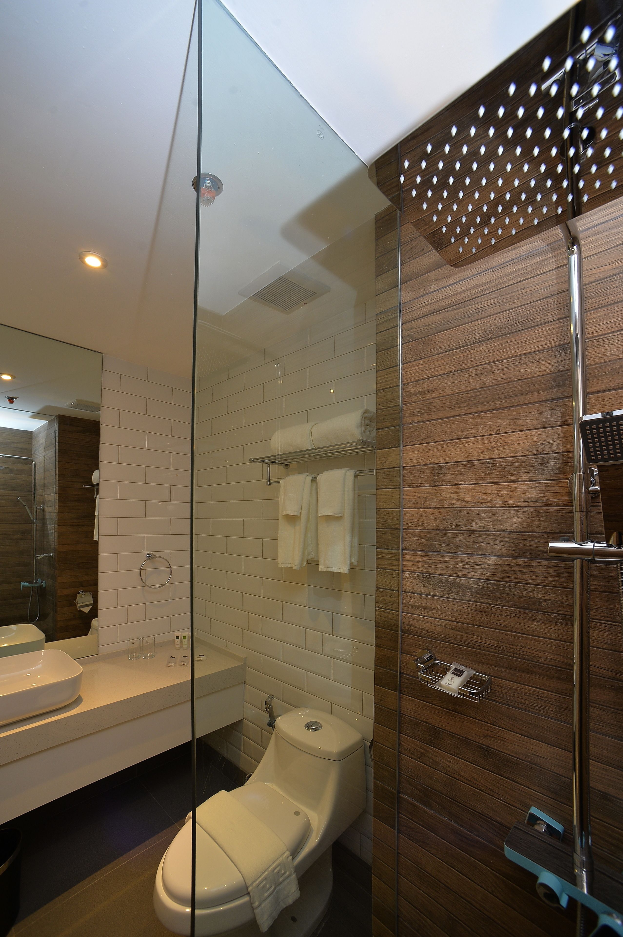 supreme room | bathroom | shower, free toiletries, hair dryer, bathrobes
