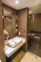 White Loft Room | Bathroom | Shower, free toiletries, hair dryer, slippers