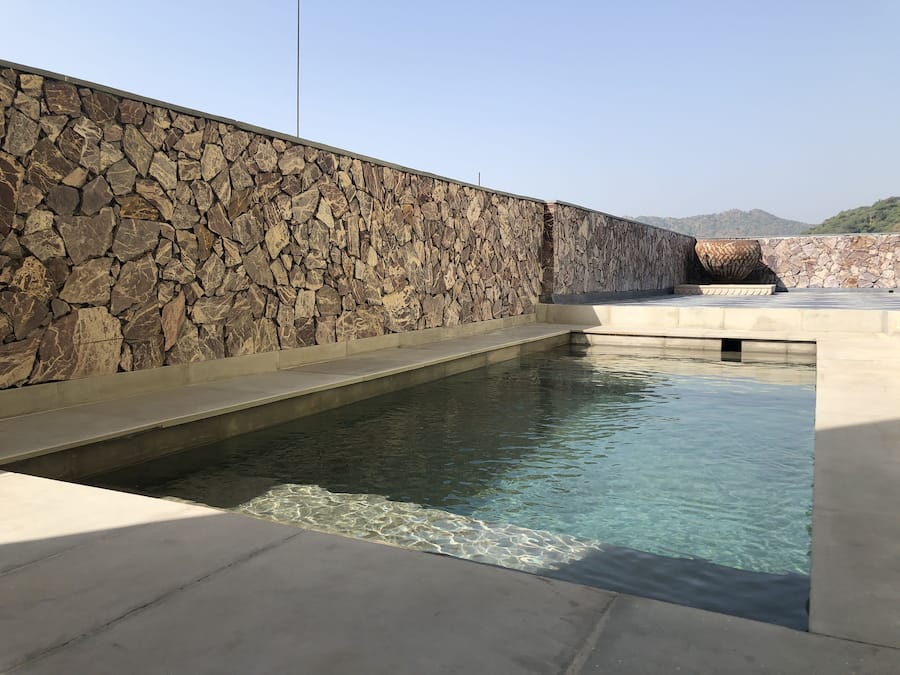 Outdoor pool, open 6:00 AM to 9:00 PM, pool loungers