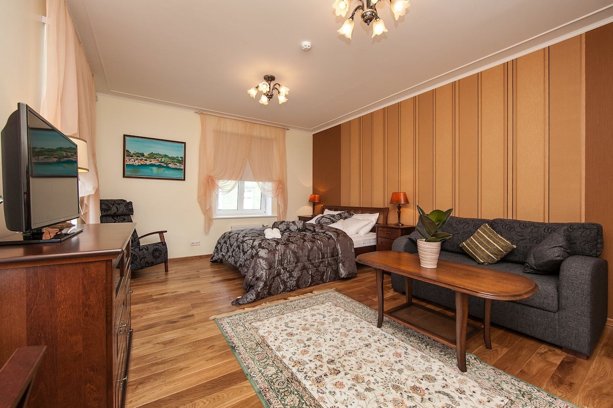 Desk, blackout curtains, free cots/infant beds, free WiFi