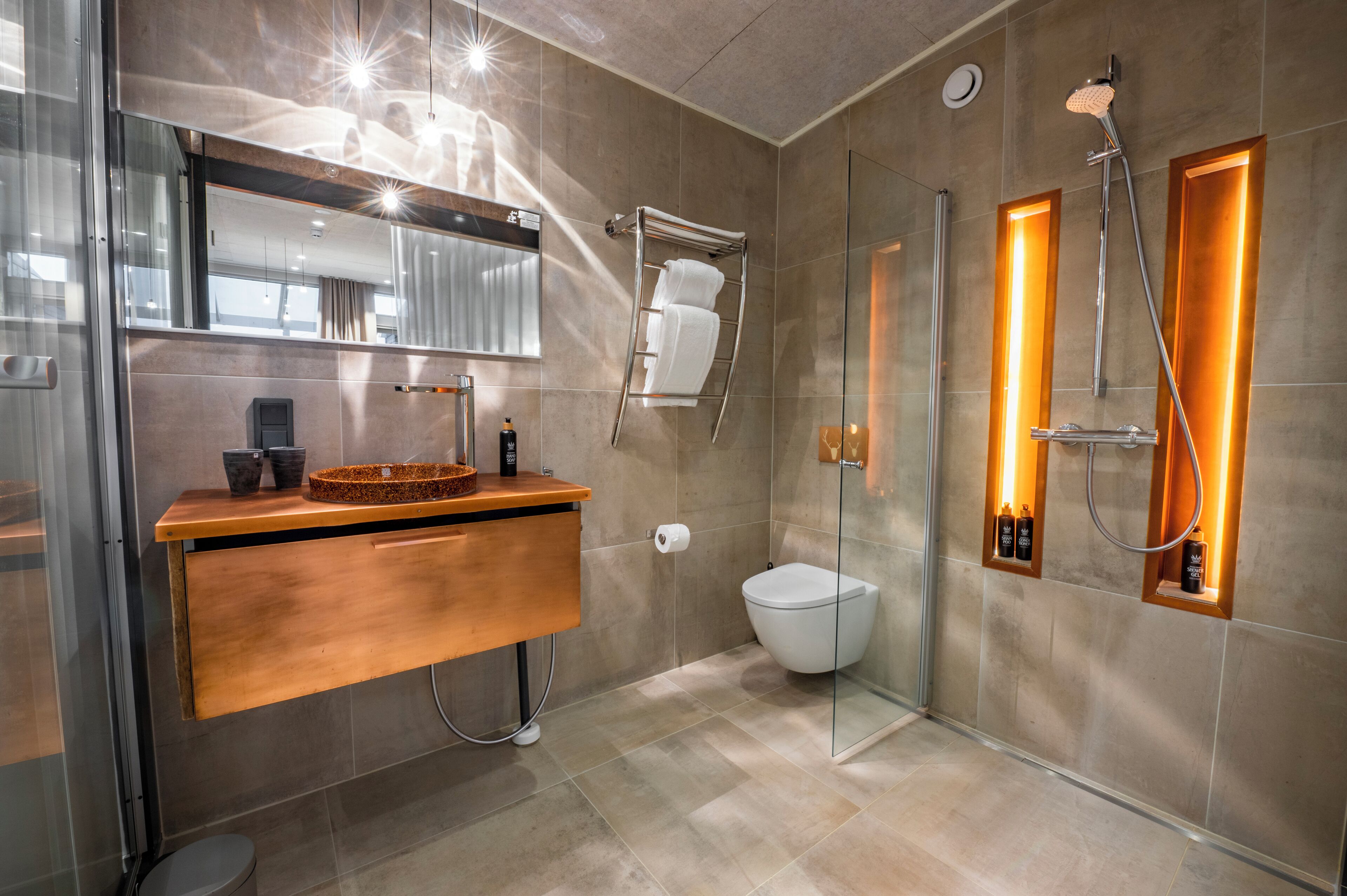 suite | bathroom | shower, hair dryer, towels