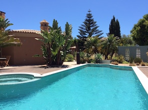 Outdoor pool, pool umbrellas, pool loungers