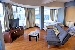 Luxury Apartment, 1 Bedroom | Living area | 60-cm flat-screen TV with cable channels, Smart TV - Patagonia Home Center (Ushuaia)
