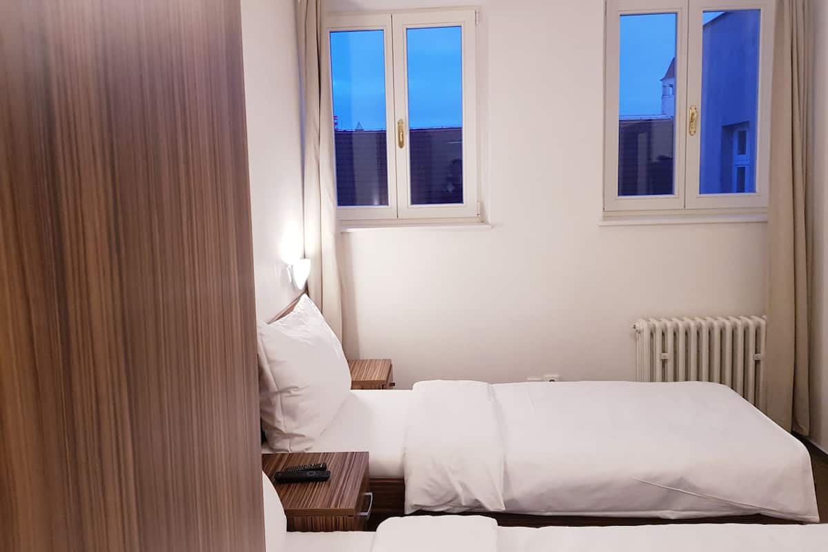 Blackout drapes, WiFi (free), bed sheets