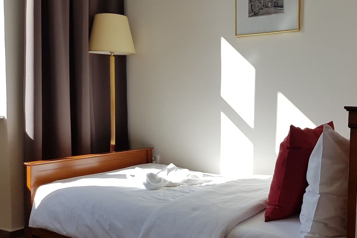 Blackout drapes, WiFi (free), bed sheets
