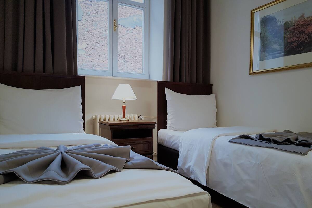Blackout drapes, WiFi (free), bed sheets