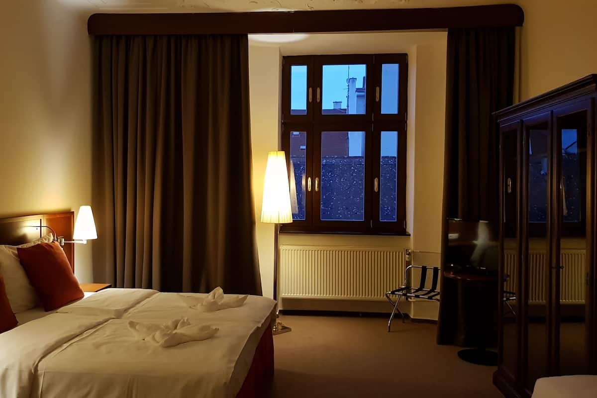 Blackout drapes, WiFi (free), bed sheets