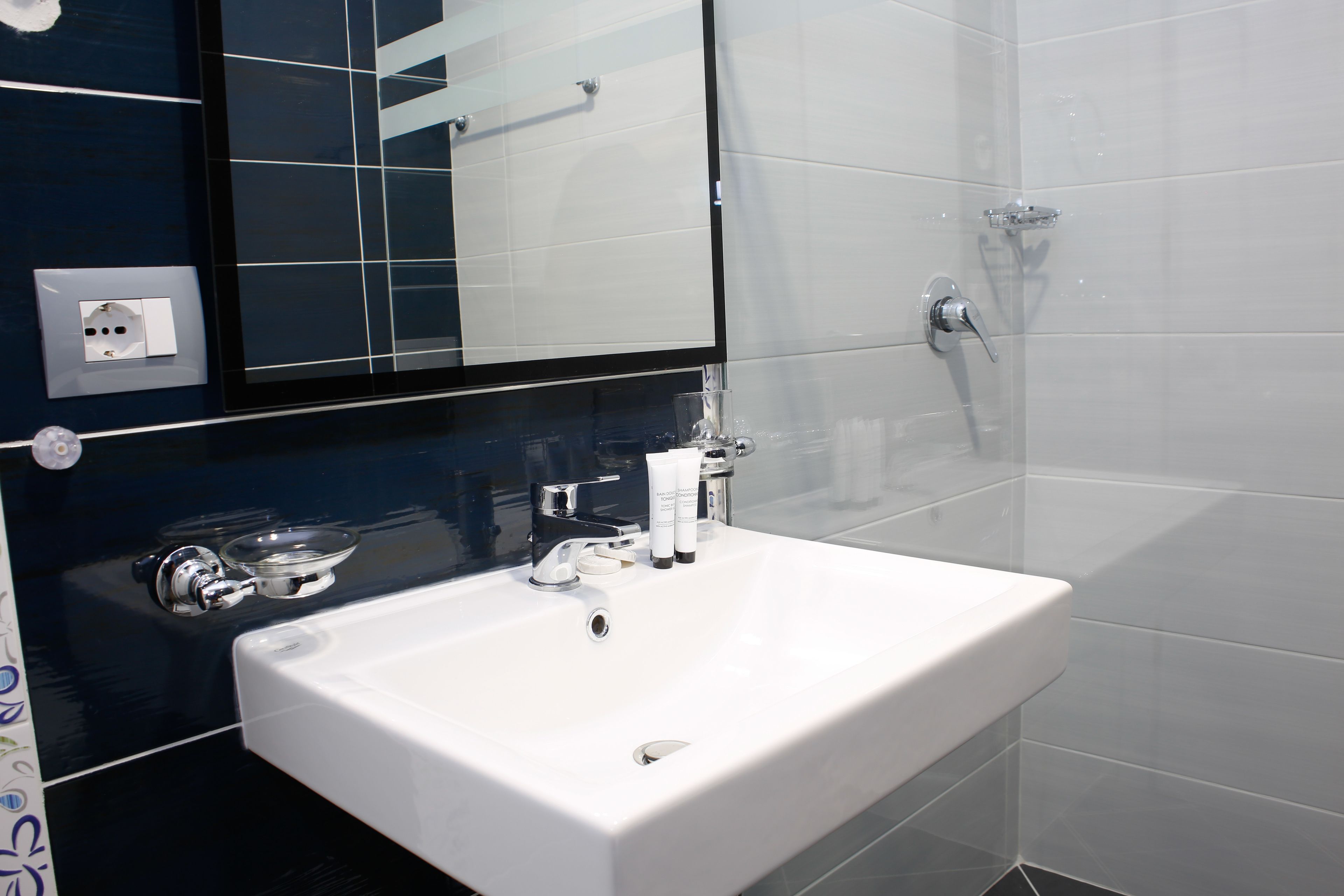 shower, hair dryer, slippers, bidet