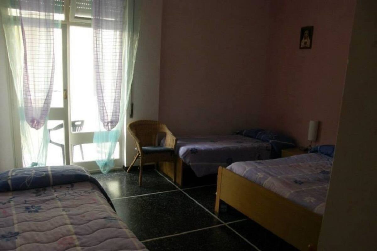 Habitación, varias camas | Ropa de cama