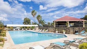 2 outdoor pools, open 9:00 AM to 7:00 PM, pool umbrellas, pool loungers