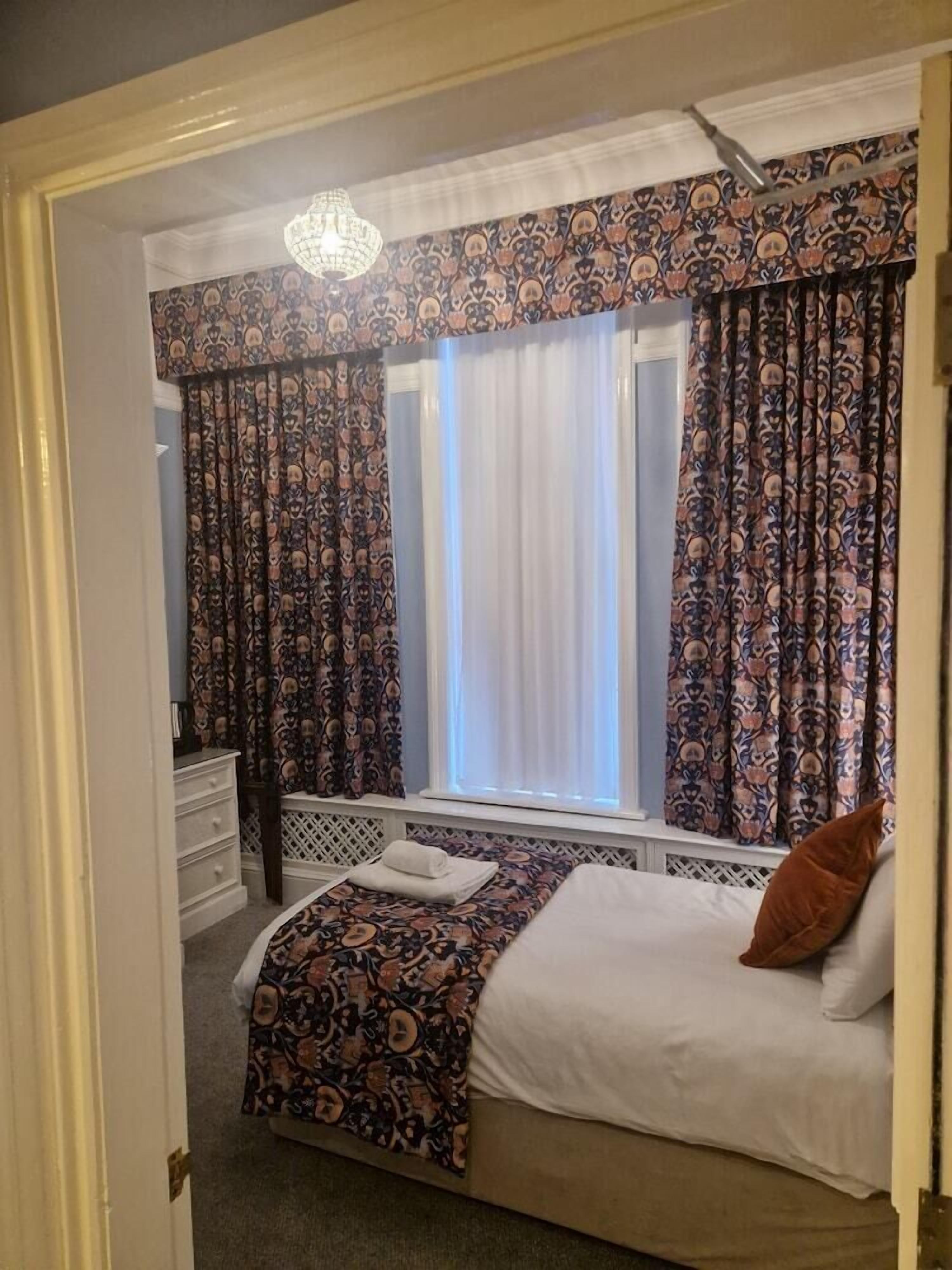 Premium bedding, individually decorated, individually furnished, desk