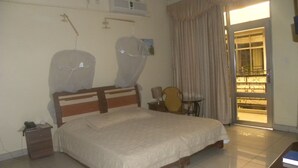 Room, Multiple Beds, Non Smoking | Fan - Dorado Hotel Bujumbura (Bujumbura)