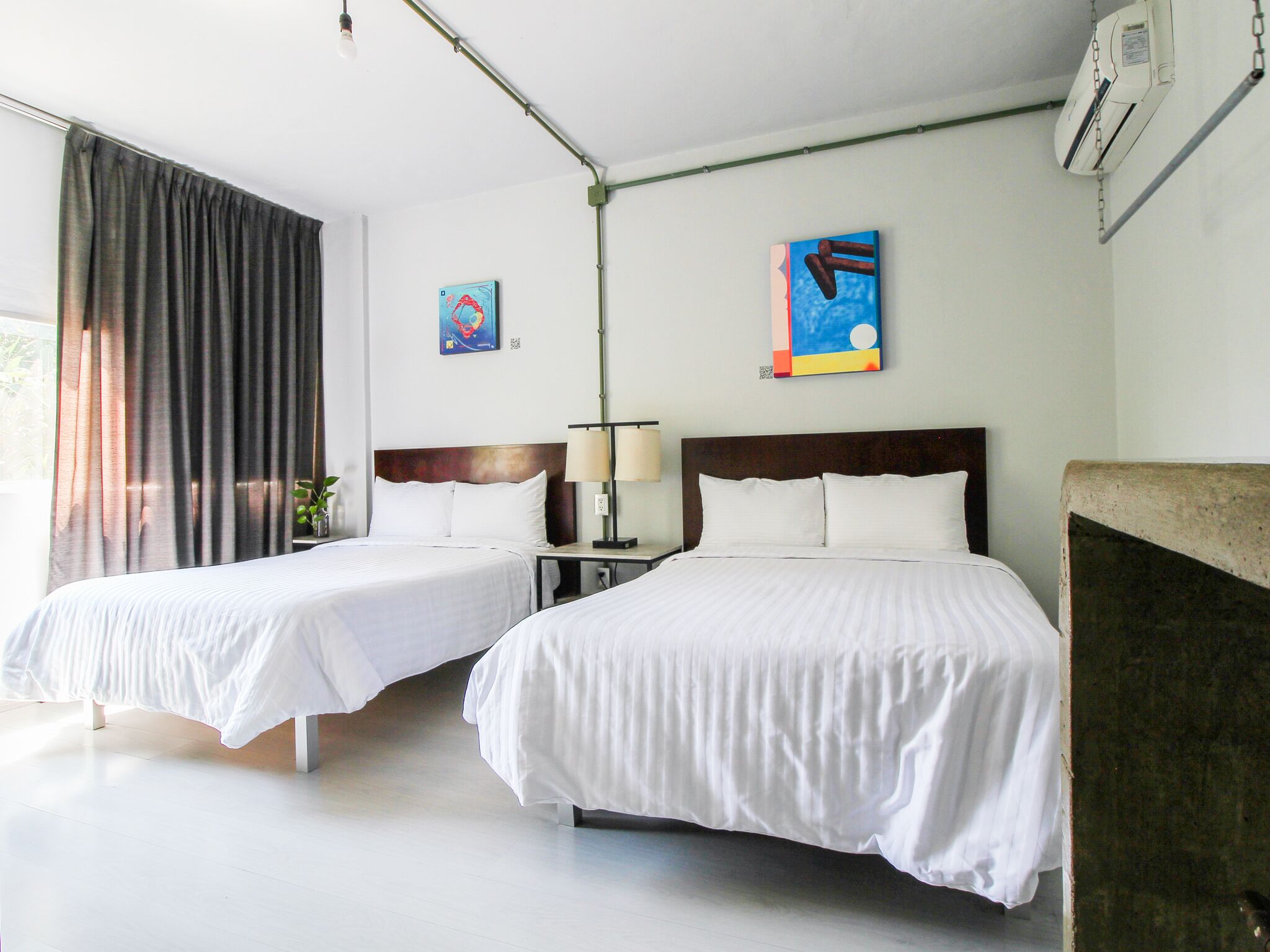 city quadruple room, 2 double beds | down duvets, iron/ironing board, free wifi, bed sheets