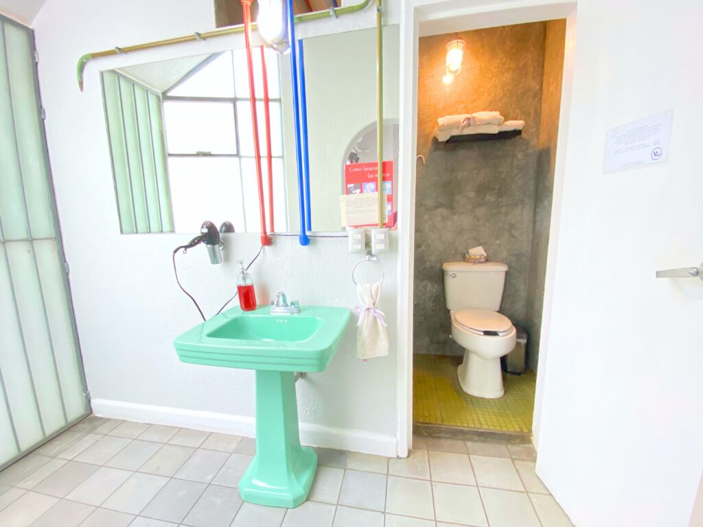 deluxe quadruple room, 2 double beds | bathroom | shower, free toiletries, hair dryer, towels