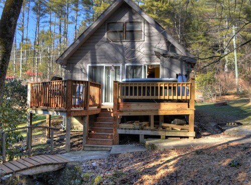 Discover tranquility at Creekside Waterfalls, a cozy 1-bedroom cabin in Fleetwood, NC.