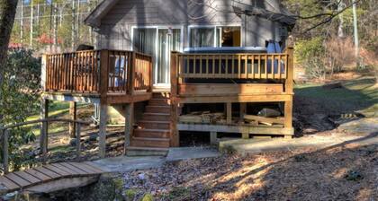 Discover tranquility at Creekside Waterfalls, a cozy 1-bedroom cabin in Fleetwood, NC.