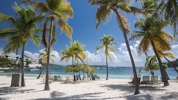 On the beach, sun-loungers, beach towels