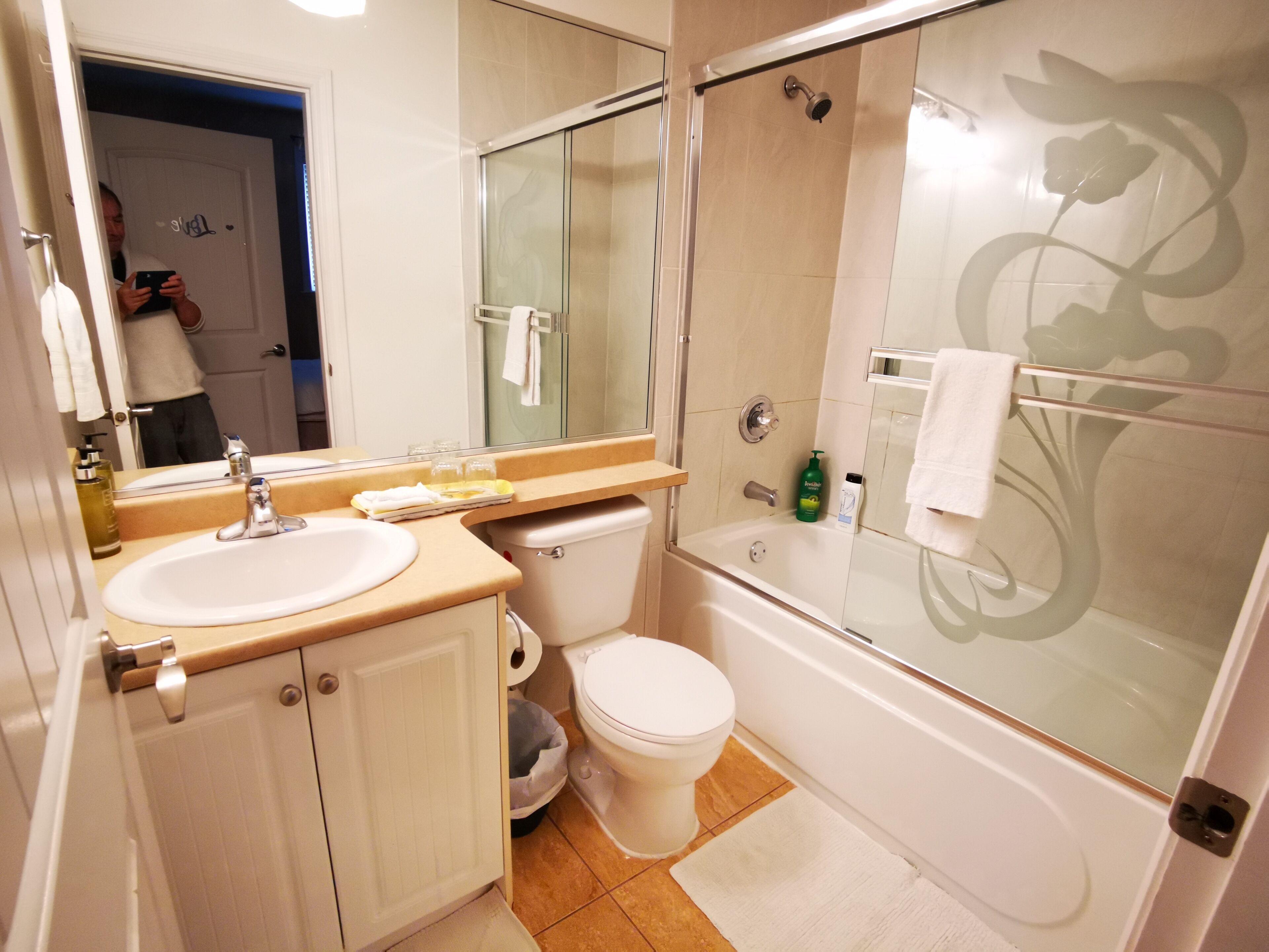 Grand Suite, 1 Bedroom | Bathroom | Combined shower/tub, hair dryer, slippers, towels
