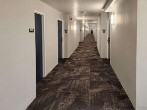 Desk, laptop workspace, blackout curtains, iron/ironing board