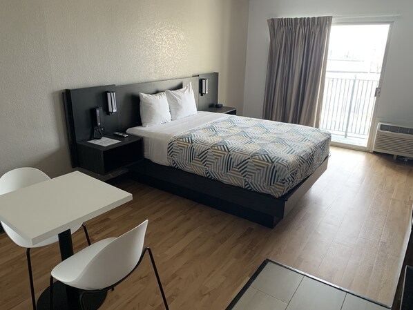 Desk, laptop workspace, blackout curtains, iron/ironing board