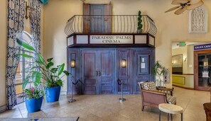 Step into Paradise Palms Cinema, where a classic design and welcoming seating area invite you to relax.