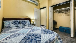 A bedroom with a bed, a wardrobe, and a ceiling vent. - Secluded Nampa Idaho Home, Near Shopping (Nampa)