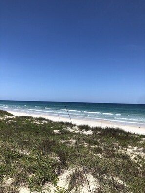 On the beach, beach towels - Harbour Village: golf, two beds, two baths, marina, and most spectacular beach.  (Ponce Inlet)