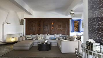 Flat-screen TV, video games, DVD player, toys