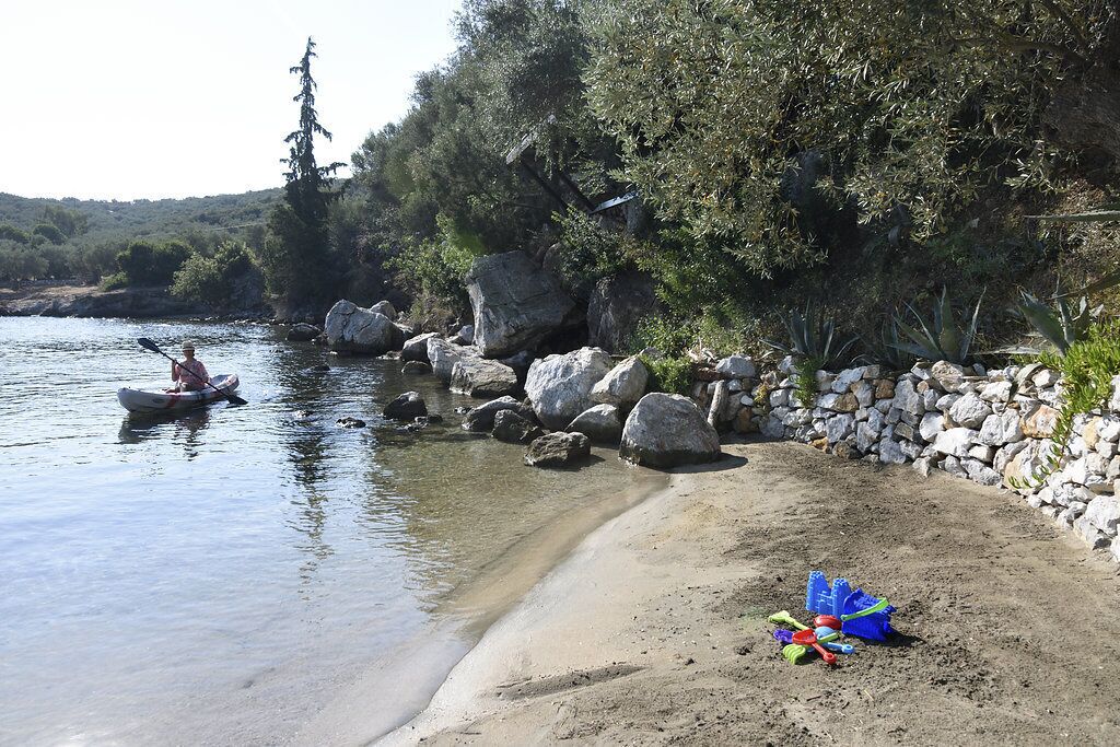 On the beach, sun loungers, beach towels