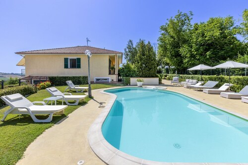 Elegant and comfortable villa with pool and panoramic hillside views, about 30 minutes from the sea