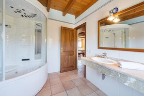 Bathtub, hair dryer, towels