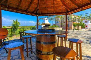 Outdoor dining - Villa Athina Finiki: Private pool and gardens, A/C, Wi Fi, sea views (Latchi)