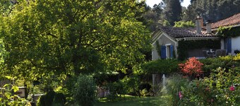Gîtes in 18th century house with pool and garden, river