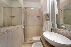 Combined shower/bathtub, hair dryer, bidet