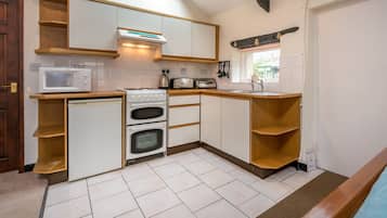Fridge, microwave, oven, cookware/dishes/utensils