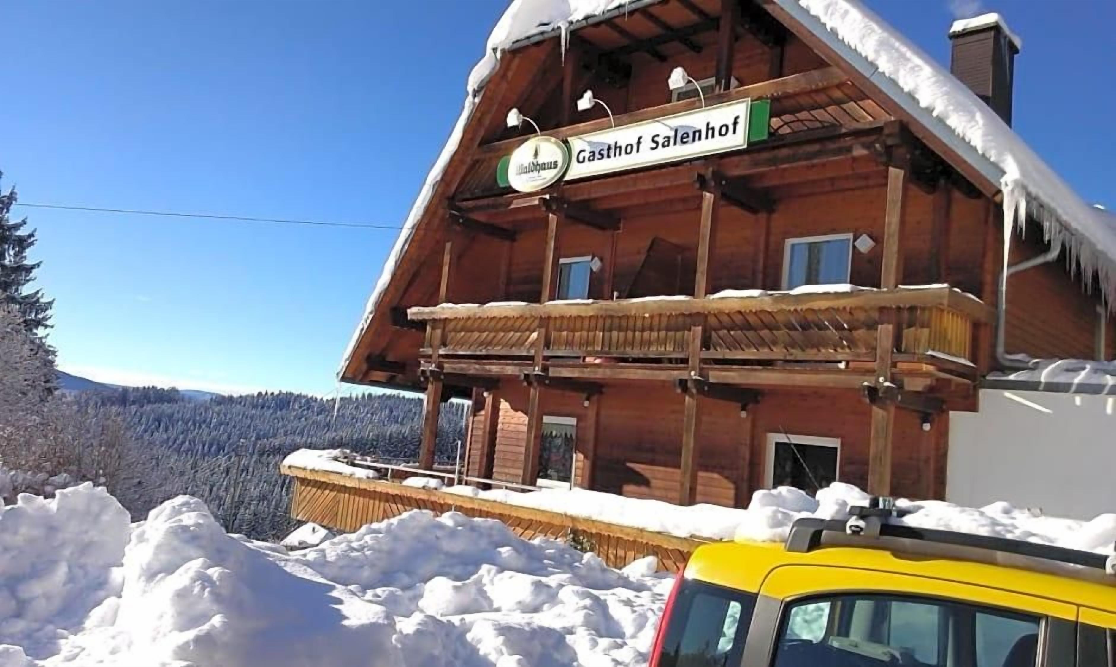 A wooden building with a sign reading 'Gasthof Salenhof.'