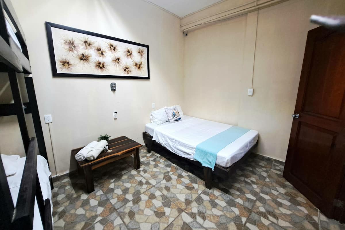 Economy Quadruple Room, Non Smoking, Shared Bathroom | 2 bedrooms, premium bedding, free WiFi, bed sheets