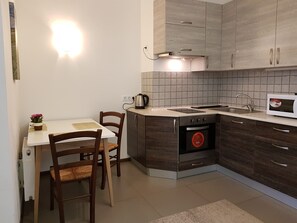 Standard Studio (Prospect Nauki, 9d) | Private kitchen | Full-size fridge, microwave, stovetop, griddle - Happy nights in friendly AP (Kharkiv)